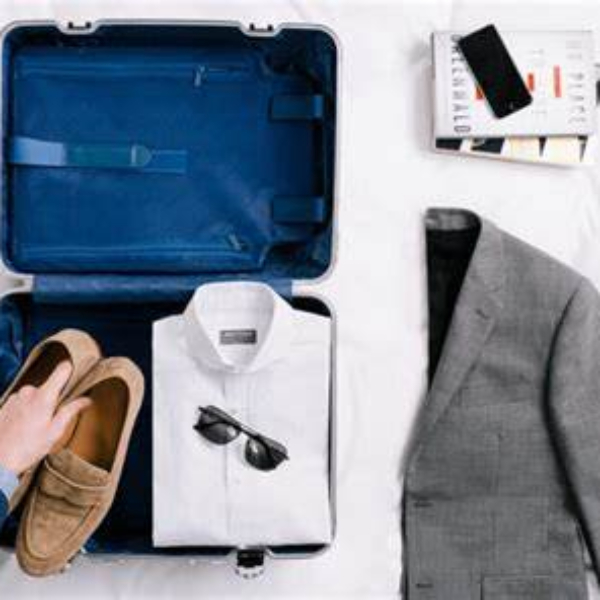 how to fold suit in suitcase