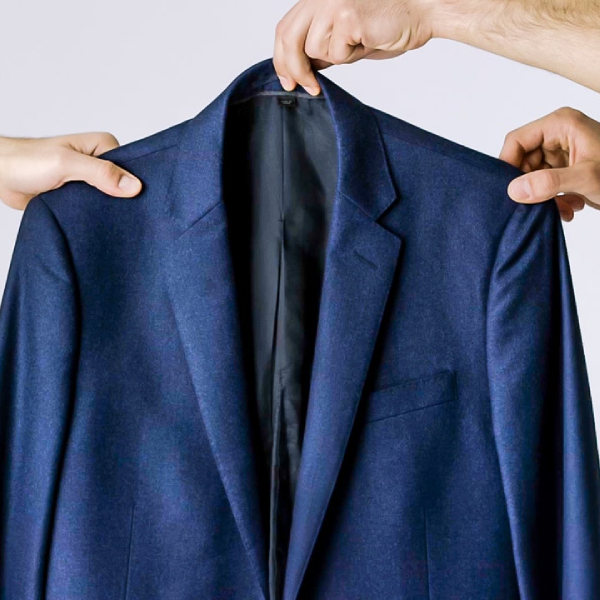 how to fold suit in suitcase